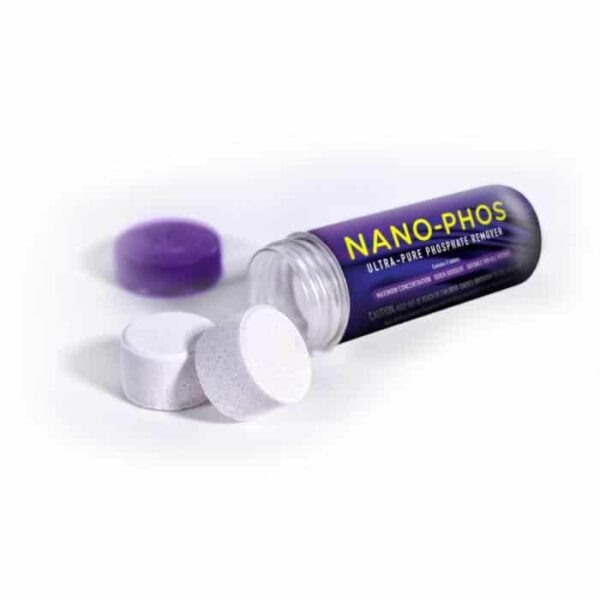 A bottle labeled ULTIMA NANO-PHOS lies on its side with the purple cap off and three large white tablets next to the open bottle.