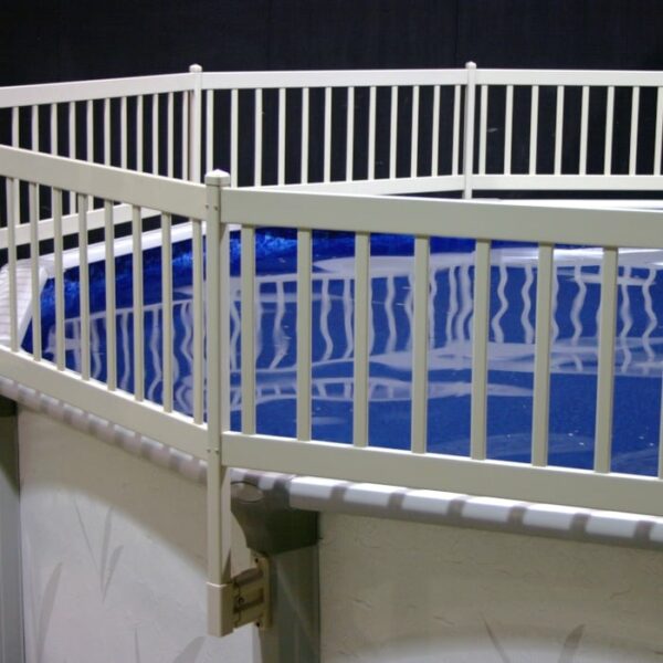 A close-up of the FENCE AG 24IN RESIN C WHITE VW securely attached to the edge of an above-ground pool, surrounding the blue water with a sturdy white metal safety barrier.