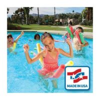 Three smiling children play in a pool using Swim Noodles. Colorful noodles float around them, with palm trees and buildings in the background. A Made in USA label is displayed in the bottom right corner.