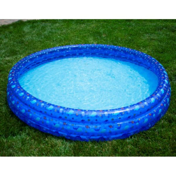 A 60IN 3 RING INFLATABLE POOL, round and blue, filled with water sits on a green grassy lawn.
