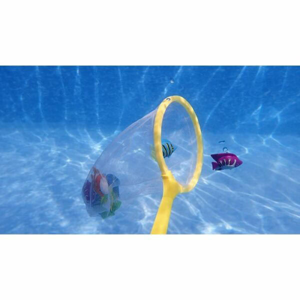 A yellow-handled net from the FISH CATCH GAME scoops up colorful toy fish underwater, with two more toy fish nearby on the pool floor as sunlight dances on the clear blue water.