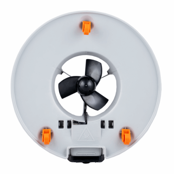 A top-down view of the VOLT RECHARGEABLE LEAF VAC, a circular gray device featuring a central black fan and four evenly spaced orange clips around the edge.