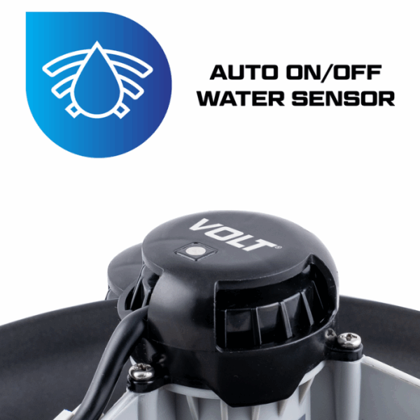Close-up of a black VOLT RECHARGEABLE LEAF VAC with attached cable on a gray base. Text reads AUTO ON/OFF WATER SENSOR next to a blue water droplet icon emitting signal lines.