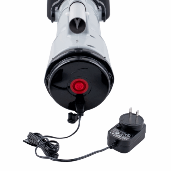 A close-up of the VOLT FX-4 LI RECHARGEABLE VAC shows its red power button, grey cylindrical body, and black power adapter with visible cord against a white background.