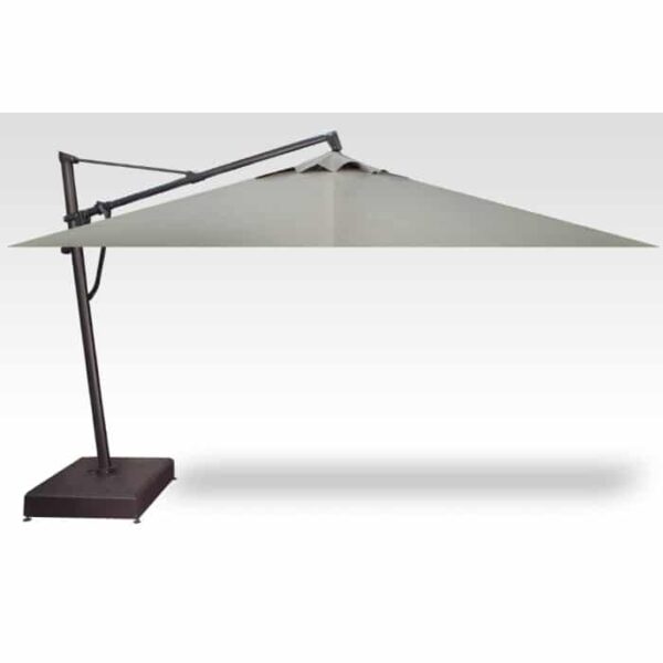 The 10 x 13 Rectangle Cantilever - Silver features a modern, angled support pole and a wide beige canopy with a square base, casting a distinct shadow on the white background.