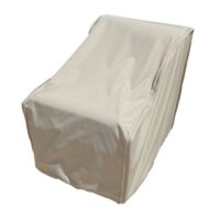A beige Cover: Modular Armless is draped over a chair, concealing its shape and details. Made from smooth, water-resistant fabric.