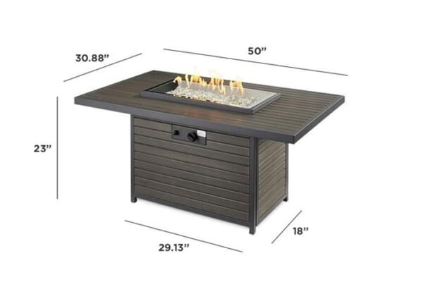 The Brooks Firepit Table features a rectangular design with a metal base, wood-look finish, and glass stones around the flame. Dimensions: 50 L x 30.88 W x 23 H; base is 29.13 x 18.