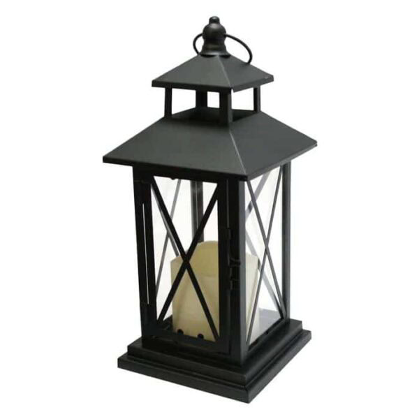 The LED Resin Candle Light / Criss Cross Lantern with Timer is a black metal lantern with glass panels, crisscross design, square base, decorative top handle, and includes a white LED resin candle inside.