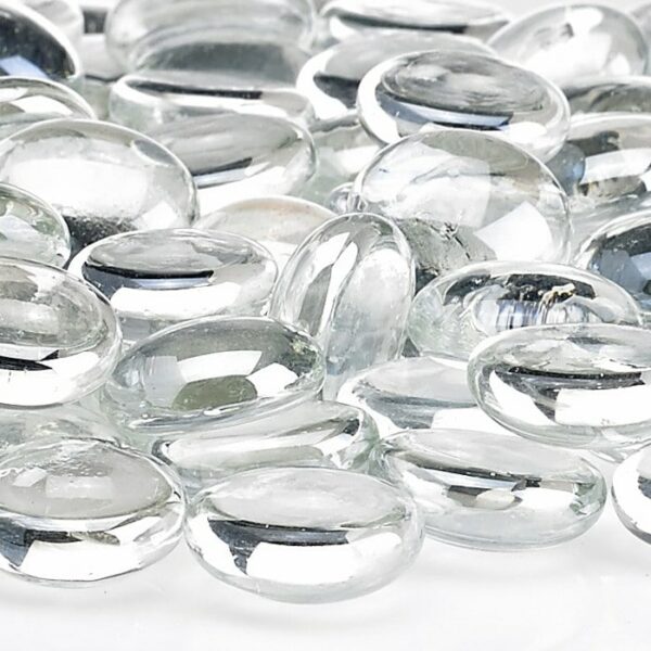 A close-up view of Glacier Ice Firebeads – 10 Lbs., clear and smooth with reflective surfaces, scattered over a white background.