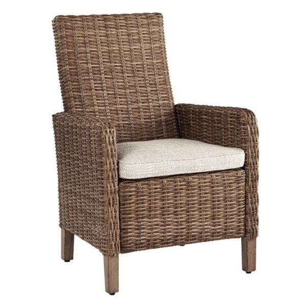 The Beachcroft 6-Piece Dining Group features a brown wicker armchair with a high back, straight arms, wooden legs, and a light beige seat cushion.