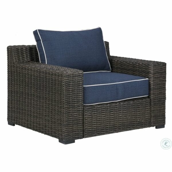 The Grasson Lane 5-Piece Grouping includes a dark brown wicker armchair with thick blue cushions, white piping, wide armrests, and a boxy design.