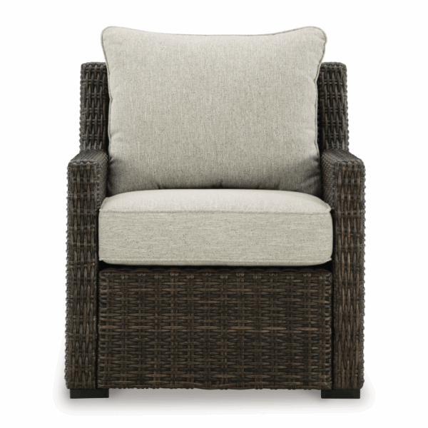 Front view of the Brook Ranch Grouping 4-Piece armchair featuring a woven dark brown rattan frame and light beige seat and back cushions, isolated on a white background.