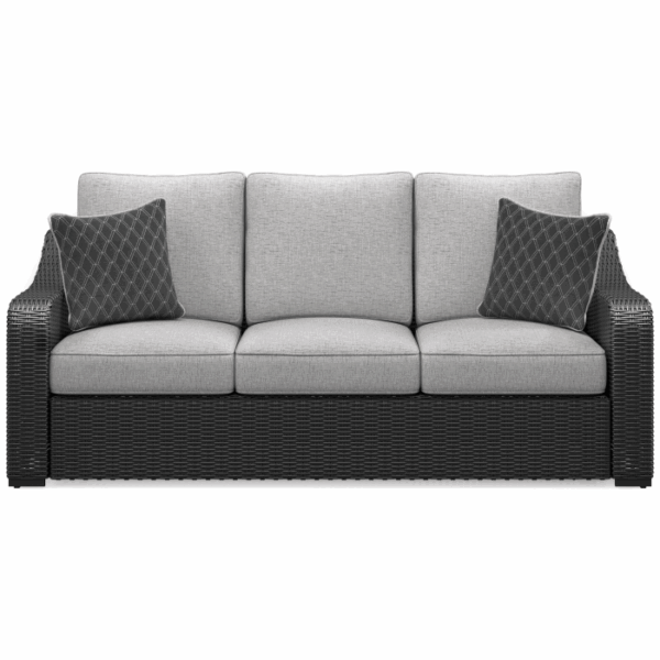 The Beachcroft Deep Seating Group Black 4 piece features a modern outdoor sofa with a black wicker frame, light gray cushions, and two dark gray patterned throw pillows, shown from the front.