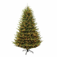 A 7.5 Scots Pine LED Clear Christmas tree with green branches and warm white lights stands on a black metal stand against a plain white background.
