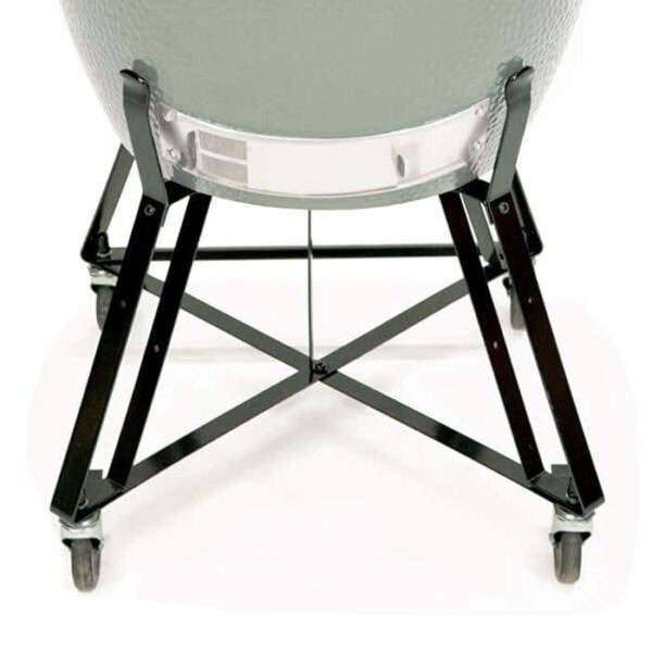 A close-up view of the Nest for XLarge Big Green Egg, featuring a green ceramic grill on a black metal stand with four wheels, highlighting the lower grill and sturdy supporting frame.