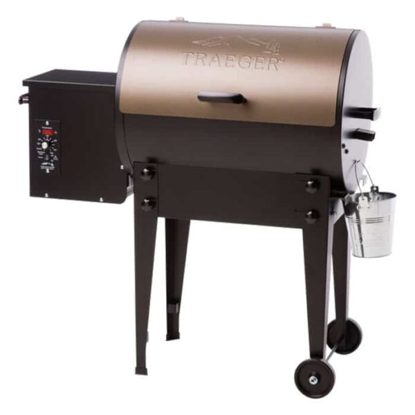 The TRAEGER-Tailgater 20 Bronze pellet grill features a bronze lid, black body, side digital controls, and a metal grease bucket hanging under the right side.