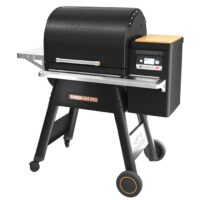 The Timberline 850 Pellet Grill features a black finish, digital control panel, side shelf, lower storage shelf, and wheels for easy movement.