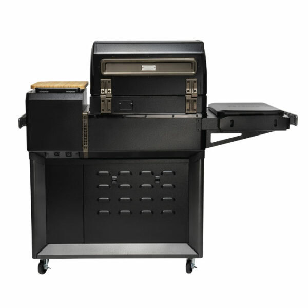 The Timberline 2022 is a black outdoor grill with a closed lid, side table, wooden cutting board, and storage compartments on wheels, displayed against a plain white background.