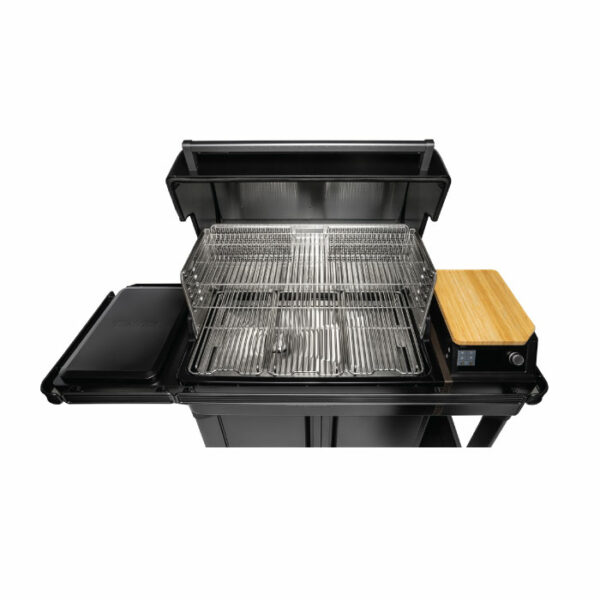 A top view of the Timberline XL 2022 grill in black, featuring an open lid, stainless steel cooking grates, a right wooden side shelf, and a left black side shelf.