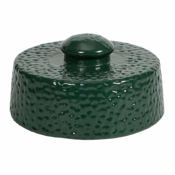 A round, dark green ceramic Big Green Egg Damper Top with a textured finish and a raised knob, resembling an avocado’s skin.