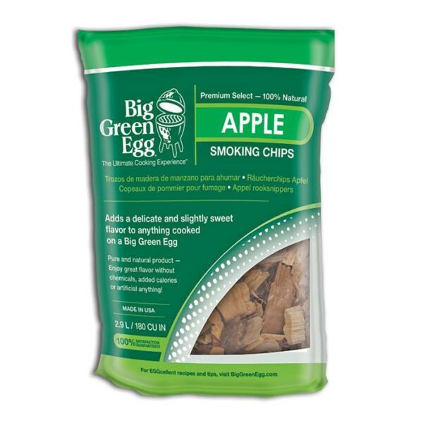A green and white bag of Smoking Chips - Apple, containing wood chips, features product details and branding. The packaging promotes natural ingredients and sweet, delicate flavor for grilling.