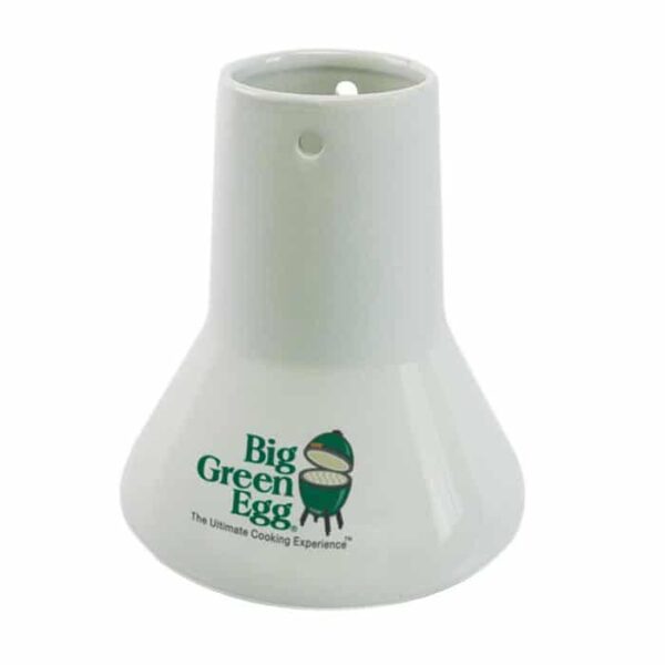 The Sittin Turkey Ceramic Roaster is a white ceramic poultry roaster with a flared base, featuring the Big Green Egg logo and grill illustration on the front, and two small holes on top.