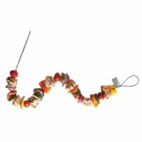 The FireWire Flexible Skewers (Set of 2) are shown threaded with grilled chicken, cherry tomatoes, red onion, bell peppers, and zucchini arranged in a wavy pattern on a white background.