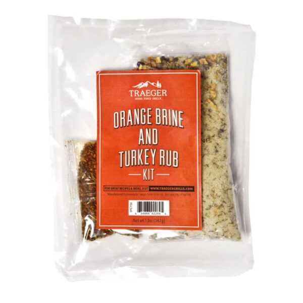 Clear plastic packaging containing Traeger Turkey Pellet Blend with Brine, featuring a red label with the product name and brand. Contents are visible through the packaging.