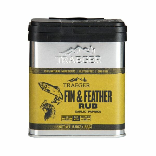 A 5.5oz (156g) silver tin of Traeger Fin & Feather Rub, with garlic and paprika flavors, a black lid, label illustrations of a fish and bird.
