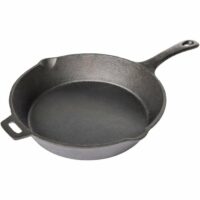 The TRAEGER 10.5 Cast Iron Skillet, shown on a white background, features a black finish, a main handle, and a small helper handle opposite it.