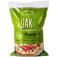 A 20lb bag of TRAEGER-Oak Pellets, featuring a green label with OAK in large letters and a wood-fired pizza image at the bottom, ideal for grills.