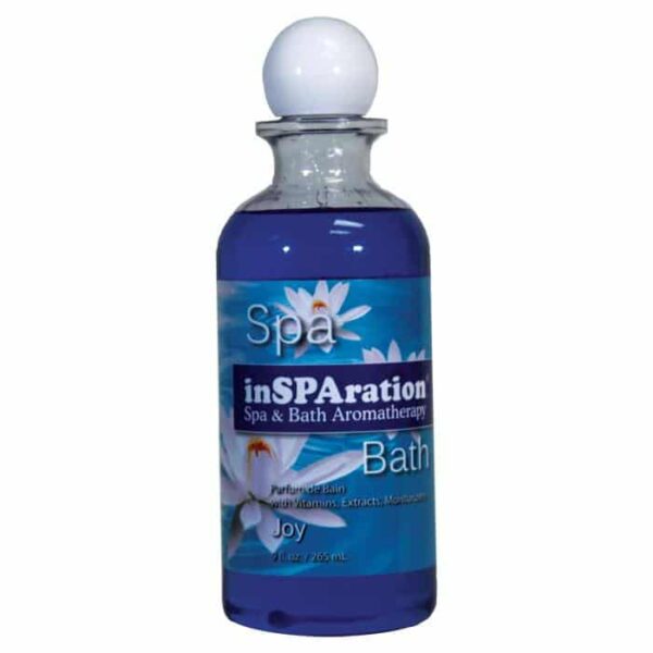 A blue glass bottle labeled inSPArations Joy Fragrance features a floral design, white cap, and contains 9 oz of liquid.