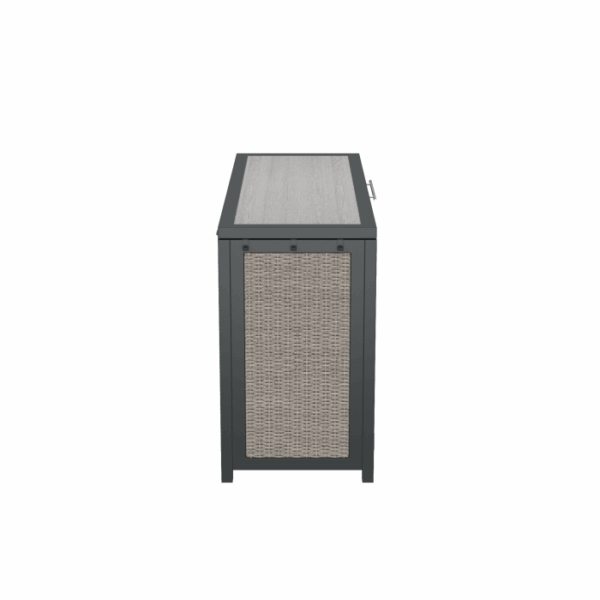 A side view of the Telluride Spa Storage Grey shows its rectangular outdoor table design, black metal frame, light wooden top, and a side panel with woven wicker detailing.