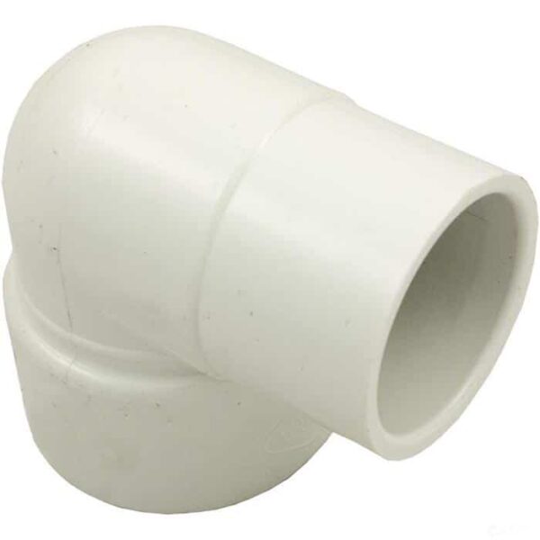 The Elbow, 90° 1-1/2 Slip x 1-1/2 Spigot is a white PVC fitting for plumbing or irrigation, used to connect two pipes at a right angle.