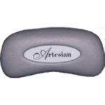 A gray, curved lounge pillow called the Artesian features the name in script on a white oval label at its center.