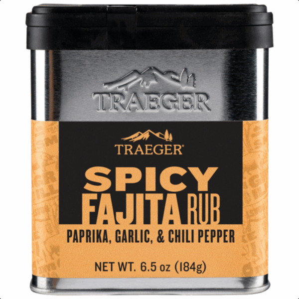 A 6.5 oz (184g) tin of Traeger FAJITA SEASONING, flavored with paprika, garlic, and chili pepper. The container features an orange and black label.