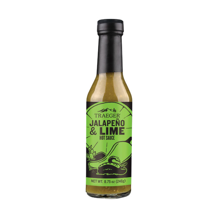 Traeger Jalapeño & Lime Hot Sauce comes in an 8.75 oz (248g) bottle with a green and black label featuring jalapeños and limes, finished with a black cap.