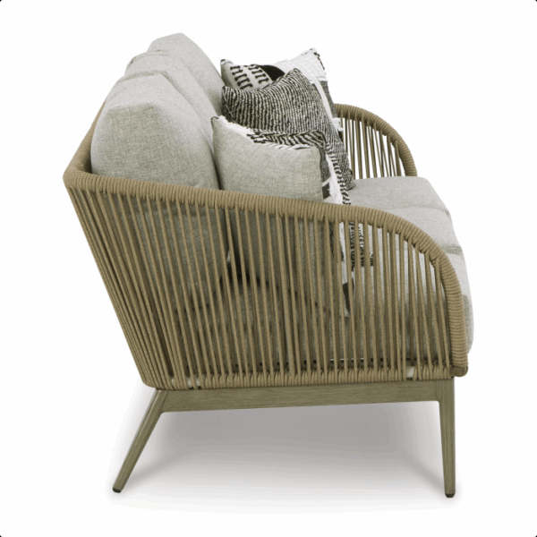 Side view of the Swiss Valley Grouping 5 piece, a modern sofa with a light wood frame, vertical rope detailing, light gray cushions, and two patterned throw pillows.