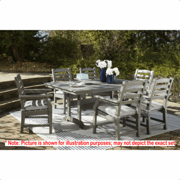 The Visola Dining Set 5 piece features a rectangular table and four chairs, shown with flower vases on top, placed on a striped rug with greenery and stone steps in the background. Picture is for illustration purposes.