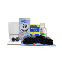 The Small Oval Winter PCKG-STD includes a pool cover roll, winter kit box, algaecide bottle, pool pillow, two black plugs, and a bundle of black tubes for winterizing your pool.