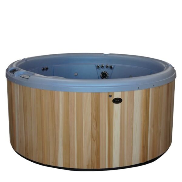 The Warrior XL features a smooth Drift Shell blue interior with several jets and control buttons, complemented by a round design and sleek black cabinet exterior.